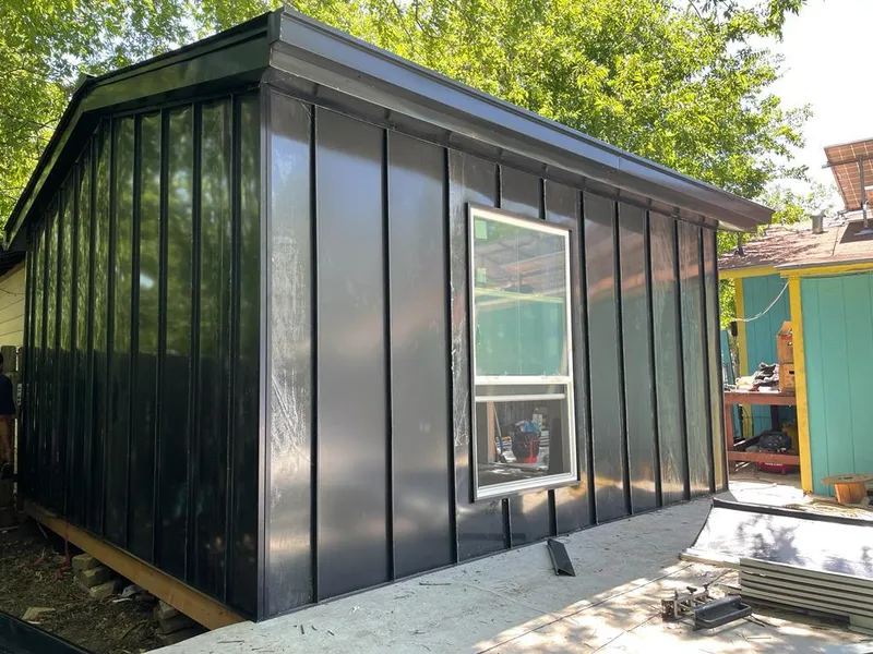 Black standing seam metal wall panels for Metal Roof Installation in Glenville