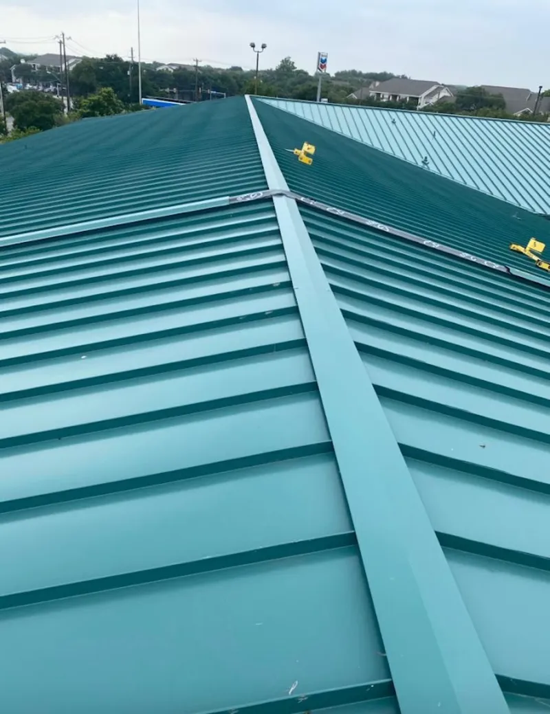 Green commercial metal roof ridge and valley for Metal Roof Repair in Glenville