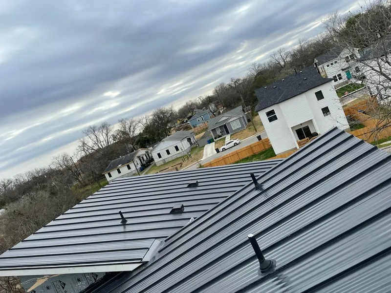 Standing seam metal roof panels with vents for Skylight Repair in Glenville